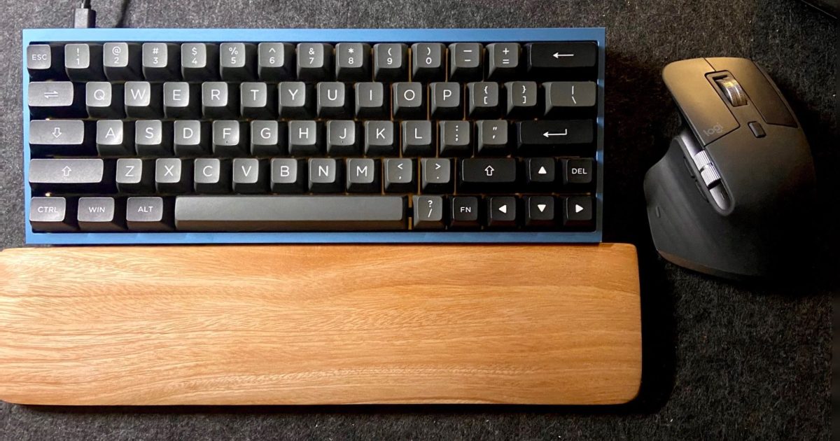 Modern Desk Setup with Tofu 60 and Logitech MX Master 3 and a wooden wrist rest