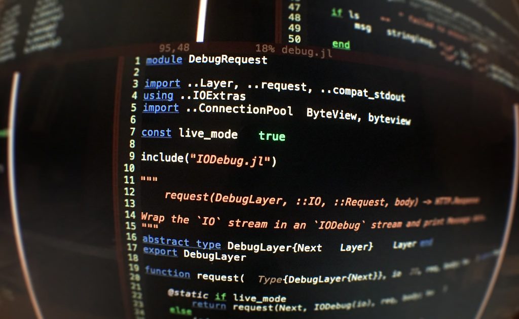 Colour-highlighted code on a monitor
