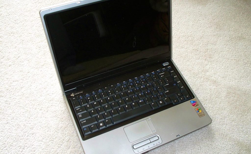 A home office desk with a computer
