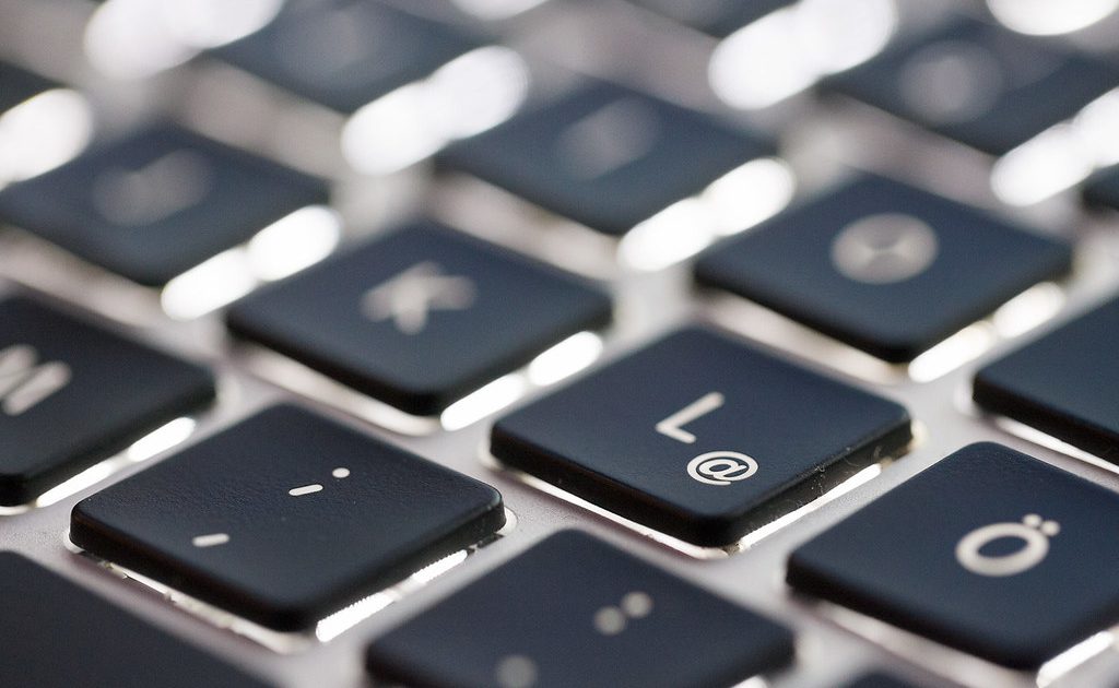 A backlit keyboard in a dark room