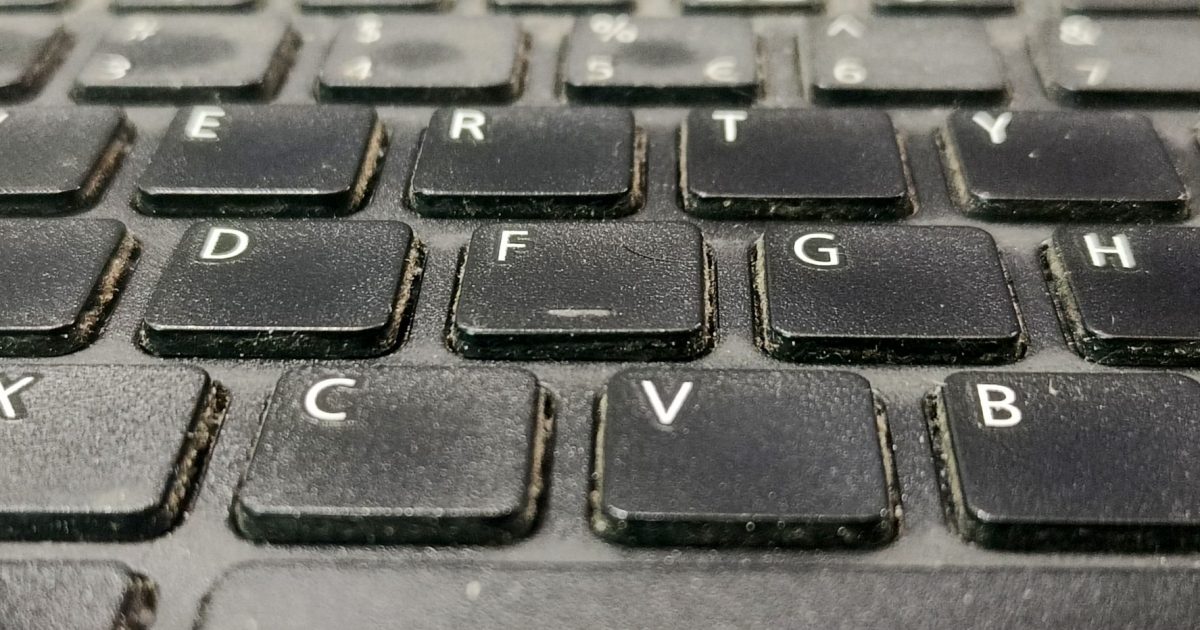 A backlit keyboard in a dark room
