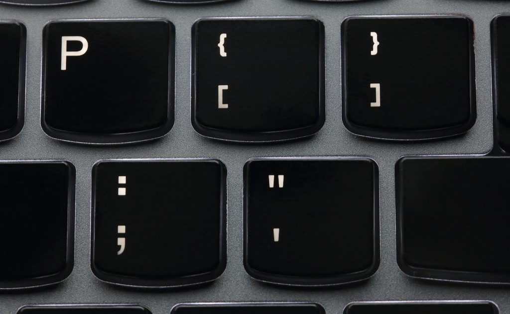 Lines of source code on a dark computer screen